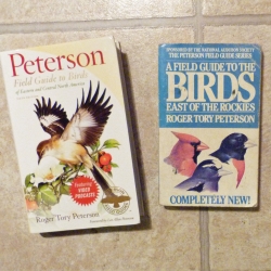 New copy next to old copy of Peterson Field Guide to Birds of Eastern and Central North America New copy next to old copy of Peterson Field Guide to Birds of Eastern and Central North America