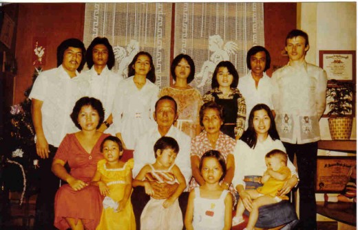 Family picture, 2 children are married (1 son, 1 daughter)with 1 daughter in law, 1 son in law, and the first grandchildren