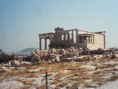 ...and the Erechtheion, an oddly-shaped temple built to enclose several sacred objects on the Acropolis, on the left.