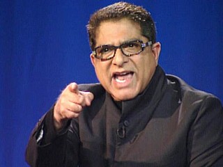 Deepak Chopra gestures during the "Nightline Face-Off" on the existence of Satan. Chopra is seen on stage at the Mars Hill Church in Seattle.(ABC News)