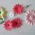 Gerbera daisy fabric flowers and black brads Gerbera daisy fabric flowers and black brads