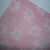 12x12 pink scrapbook paper, preferably with daisies on 12x12 pink scrapbook paper, preferably with daisies on