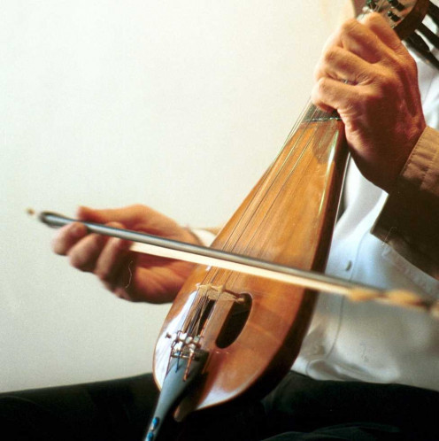 The lyra is a pear-shaped, three-stringed bowed musical instrument, central to the traditional music of the Greek islands. 