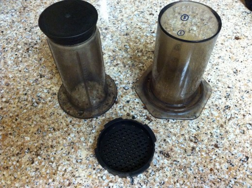 The 3 main components of the system. The small black piece in the front is what I called the cap and the filter fits in it.