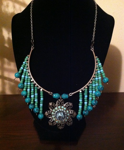 Vintage inspirations, the pendant in the middle is a vintage piece, repurposed and upcycled beauty!