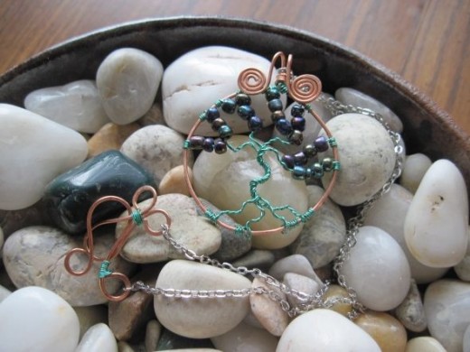 Copper tree of life with hues of blues, purples and greens