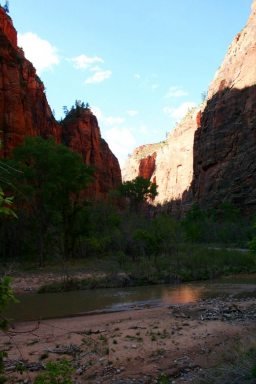 The river winds slowly through the canyon but is icy cold in April