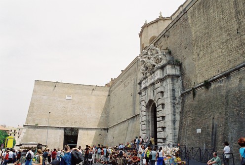 The entrance and exit to the Vatican Museums. The wall is the "border" between Italy and the Vatican City.