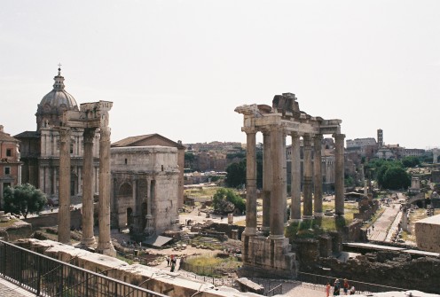 The Roman Forum. 3 columns on the left: Temple of Castor & Pollux. Center: Arch of Septimus Severus. Columns on the right: Temple of Saturn.
