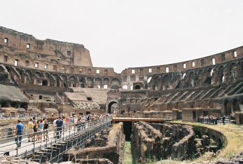 Inside the Colosseum. The original floor is now gone, so you can see directly down into the lower chambers. The white marble area in the top-center of the stands is where the emperor would sit during the "games".