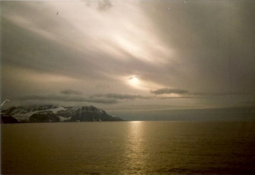 The midnight sun!   It really is quite amazing and looks as bright at midnight as at noon.   It really is a bit disconcerting to look at your watch and not know for sure whether it's afternoon or night.