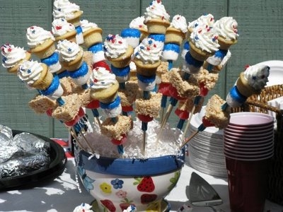 Disco Cupcakes have a Great Display for their Patriotic Themed Kabobs.  can check out their blog here: http://discocupcakes.blogspot.com/2009/07/fourth-of-july-star-spangled-cupcake.html