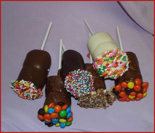 Marshmallows on a stick. Add a candy stick, dip in melted chocolate and decorate with various candies.