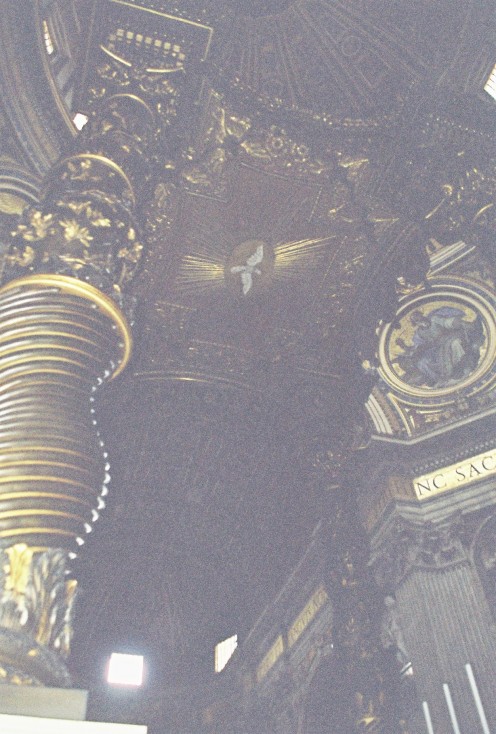 Looking up into the Baldacchino. Lots of dark wood & gold.