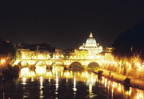 Saint Peter's Basilica and Ponte Sant'angelo, beautifully reflected in the Tiber River.