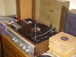 An ancient stereo and a stack of vinyl waiting to be digitized that's all we need!