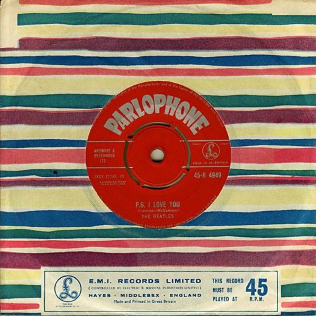 The Beatles Love Me Do b/w P.S. I Love You Parlophone Records 45 R 4949 7 in. Vinyl Record Beach stripe Company sleeve colored wavy lines with Parlophone logo in a box on front