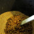 mixing the seeds with cooking oil and chicken mash mixing the seeds with cooking oil and chicken mash