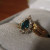 This was the first "real" ring I bought myself. An honest to goodness emerald. I wouldn't have been able to afford it had I not been working in a jewelry store at the time. This was the first "real" ring I bought myself. An honest to goodness emerald. I wouldn't have been able to afford it had I not been working in a jewelry store at the time.