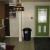 The view of the kitchen facing the door from the carport. The view of the kitchen facing the door from the carport.