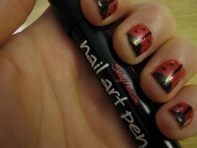 Ladybug nail art thanks to Sally Hansen!
