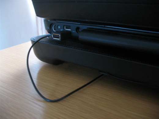 The Zalman ZM-NC3 laptop cooler plugged into a USB port. Not it gives you the port back.