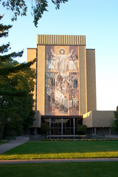 The mural of Christ on the south side of the Notre Dame library building, popularly known as "Touchdown Jesus", is clearly visible from the football stadium and has become an iconic feature of the Notre Dame campus.