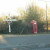 Old signpost and telephone box Old signpost and telephone box