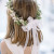 A bow tied to the back of a crown is really pretty in this one from Elizabeth Anne.http://www.elizabethannedesigns.com
