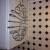A trivet hangs using an 's' hook so I can grab it when needed.