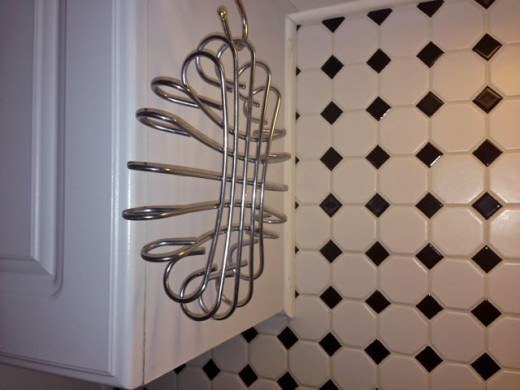 A trivet hangs using an 's' hook so I can grab it when needed.