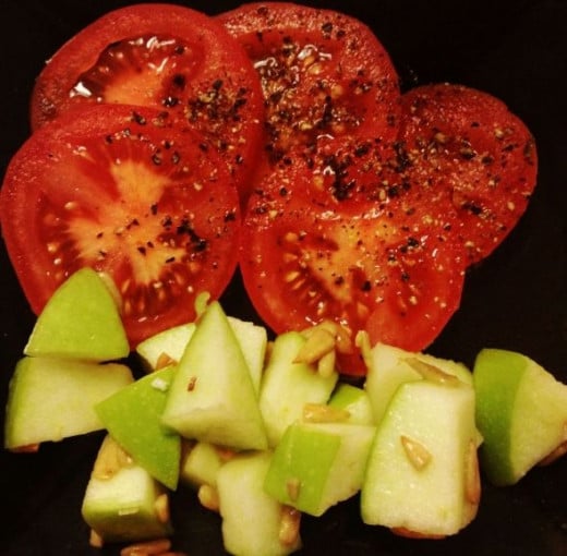 Tomato, apple and sunflower seed salad