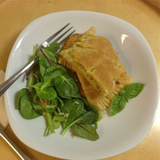 Serve cheese and onion pasties with salad