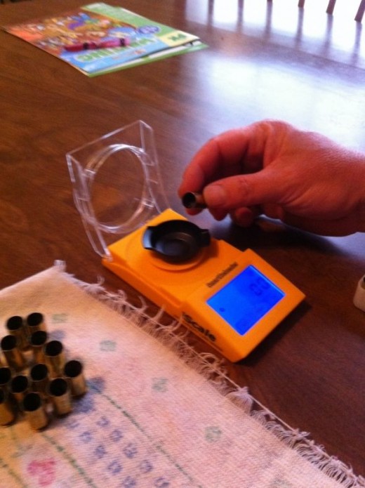 dumping powder into scale