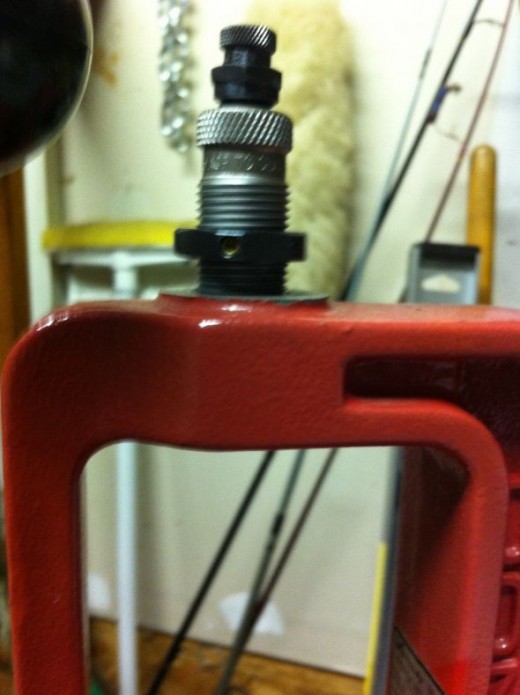 preparing to adjust reloading press