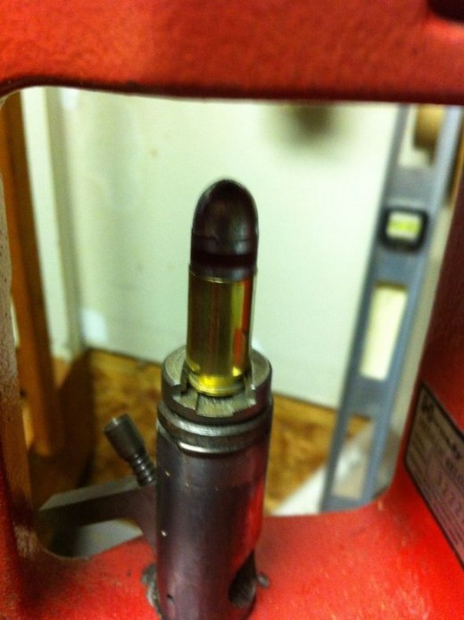 reloading die adjusted ready to load ammo