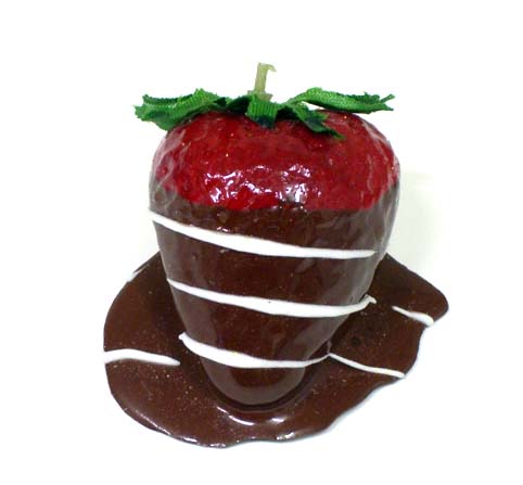 To add white chocolate drizzle, melt white chocolate and dip a fork into the white chocolate and drizzle over the chocolate dipped strawberries