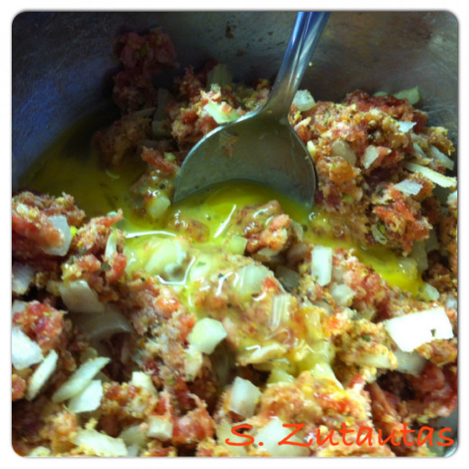 Add the beaten egg and mix well again