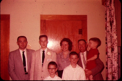 That's me on the left, with my parents, and four younger brothers.