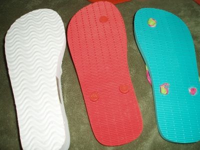 The backside of the 2 different types of sandals