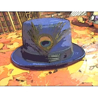 I made this hat for a friend.  I buy new cheap hats and paint and decorate them and give them away to friends.  They make great costumes. 