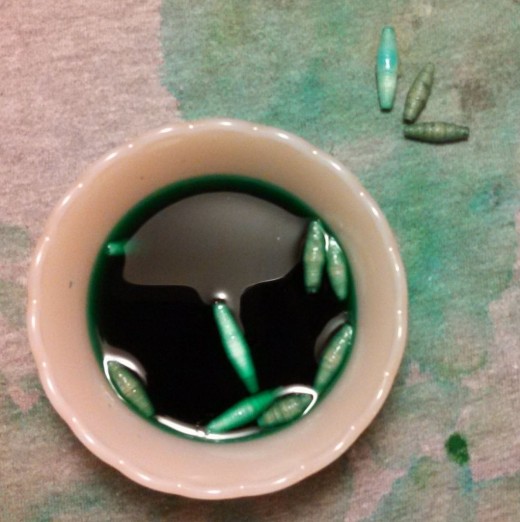 I used simple food coloring for dye - 9 drops green & 3 drops blue in about 1/2 cup water. Experimenting with colors is fun!