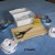 The board is part of an old, small packing crate. You also need scissors, Goop Off to clean them, Velcro strips smooth and tacky, and six short cans. The board is part of an old, small packing crate. You also need scissors, Goop Off to clean them, Velcro strips smooth and tacky, and six short cans.