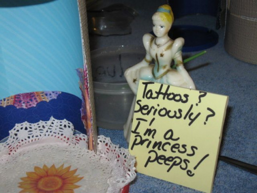 Nadia here - See what I mean? Tattoos! Come on. The girl is nuts.