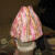 When dry, about five to ten minutes, fold the top of the napkins in a fan. Glue down to the rafters.