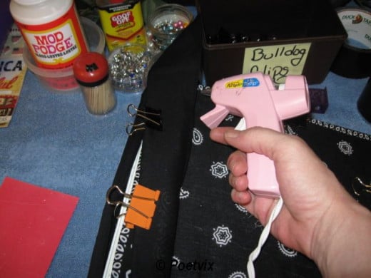 Use the exact same clip, fold up, glue and repeat method we used on the covers. Remember to re-clip to hold after you glue.