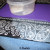 Mod Podge works great, but it takes a long time to dry really well. Use the backing from the wide roll Duck Tape to help. Put them under your notebook, if you want to keep working and not have so much down time waiting for the Mod Podge to dry. I fig Mod Podge works great, but it takes a long time to dry really well. Use the backing from the wide roll Duck Tape to help. Put them under your notebook, if you want to keep working and not have so much down time waiting for the Mod Podge to dry. I fig