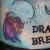 Dragon head on the left of the bottle. Dragon head on the left of the bottle.