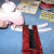 Fold down your side border ribbon on the back and glue. Wrap the trim ribbons from the front and glue on the back being careful to line up the ribbons well. Fold down your side border ribbon on the back and glue. Wrap the trim ribbons from the front and glue on the back being careful to line up the ribbons well.