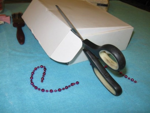 Begin doing any cutting needed on the box. Mine had a fold in lid, so I cut the fold in part off leaving just a simple top. Begin doing any cutting needed on the box. Mine had a fold in lid, so I cut the fold in part off leaving just a simple top.